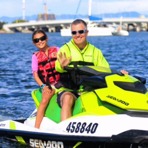 Dad and daughter enjoying jet skiing on the Gold Coast