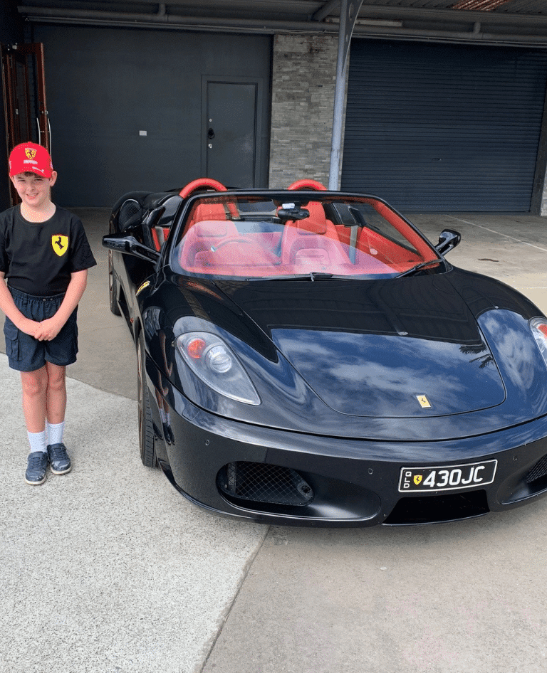 Boy with Ferrari