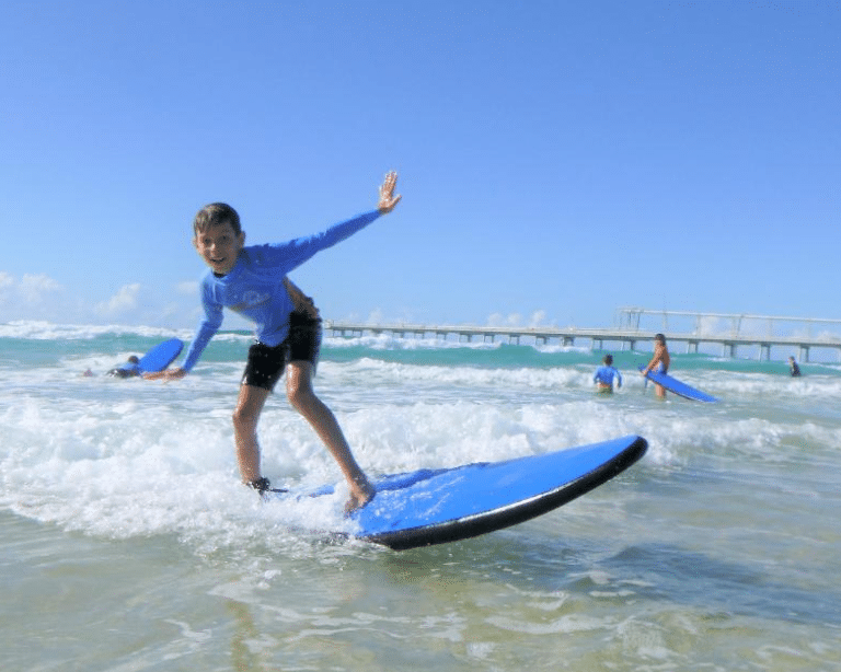 Boy riding a wave