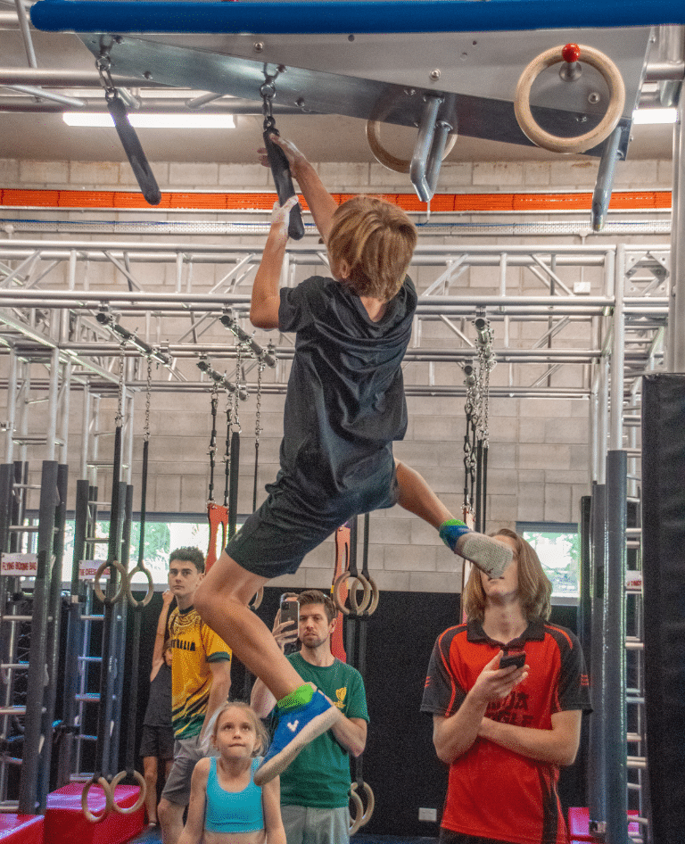 Using whole body strength to conquer ninja obstacles