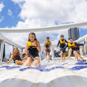 Kids love playing on this inflatable playground on the broadwater.