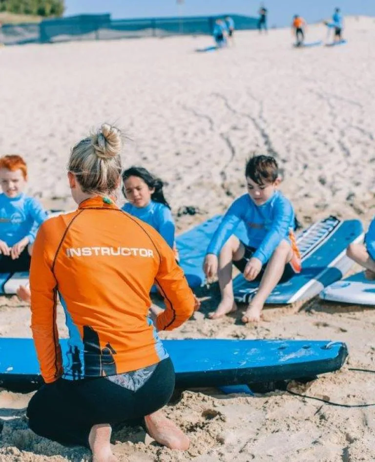 Kids learning to surf at Main Beach