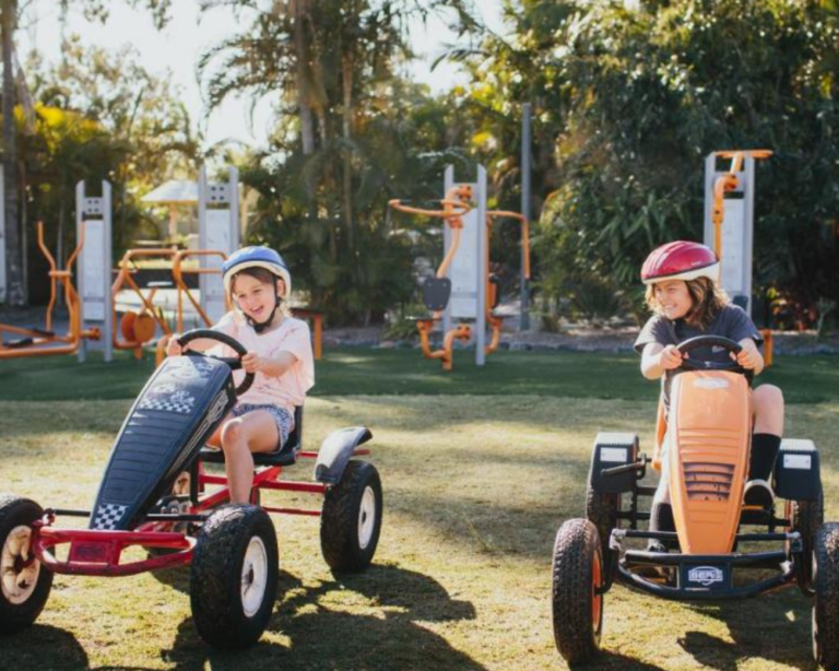 Kids riding go-karts at Treasure Island