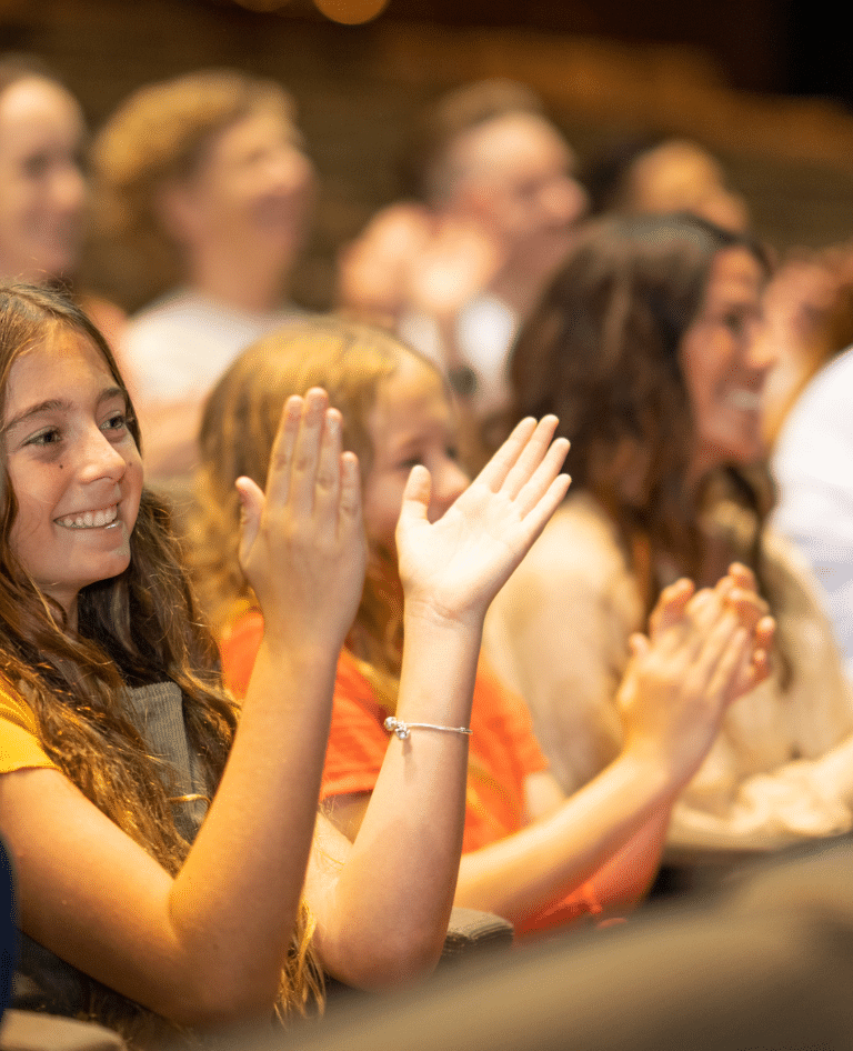 Girls applauding the show