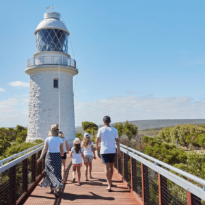 Family walking towards Cape Naturaliste Lighthouse