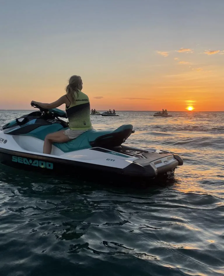 Lady on jetski at sunset in Darwin