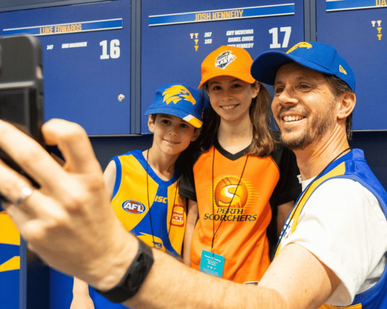 Family in the dressing sheds at Optus Stadium