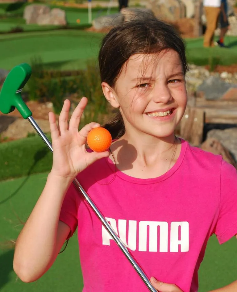 Girl with golf ball