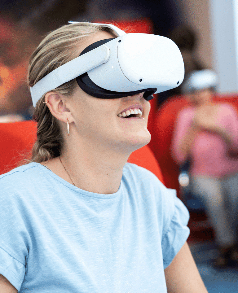 Lady experiencing flying with VR