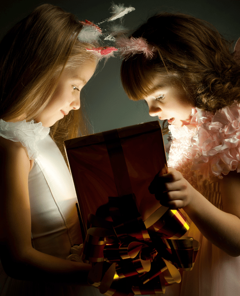 Girls looking into gift box