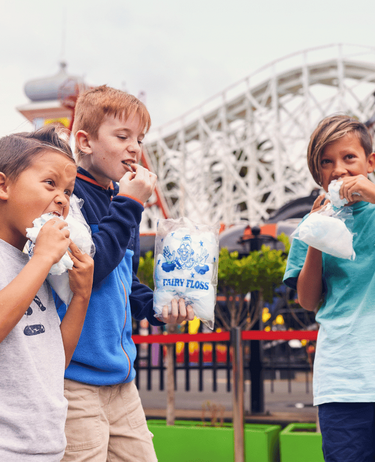 Children eating fairy floss