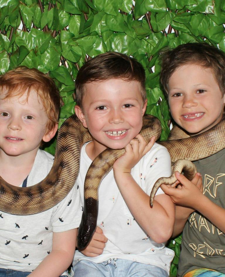 Boys with snake