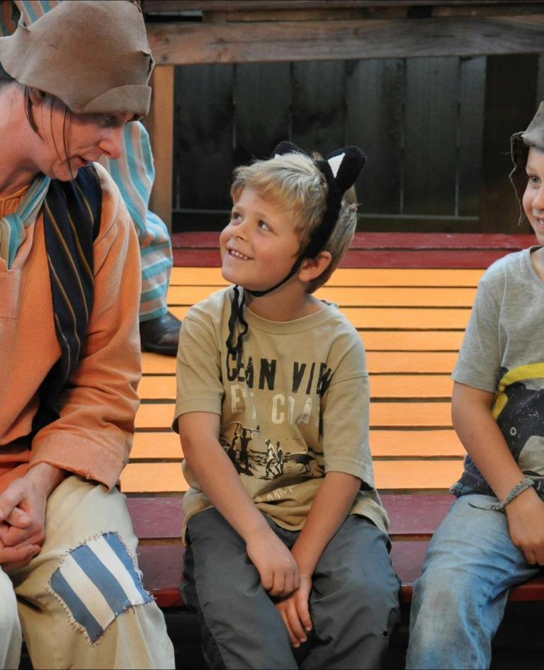 Boy wearing cat ears in the ship that never was in Strahan.